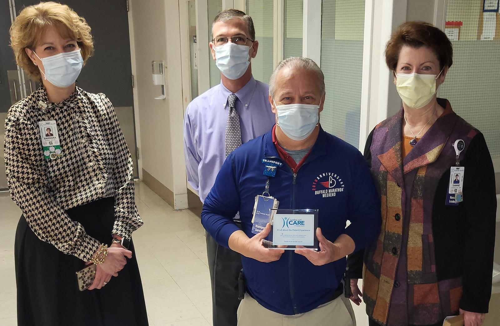 Leading with CARE Award Presented to Clair 'Butch' Heppner