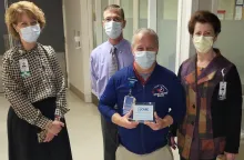 Leading with CARE Award Presented to Clair 'Butch' Heppner