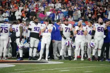 Buffalo News: Playing While Coping: After Damar Hamlin's injury, Bills balance thinking about teammate, preparing to play